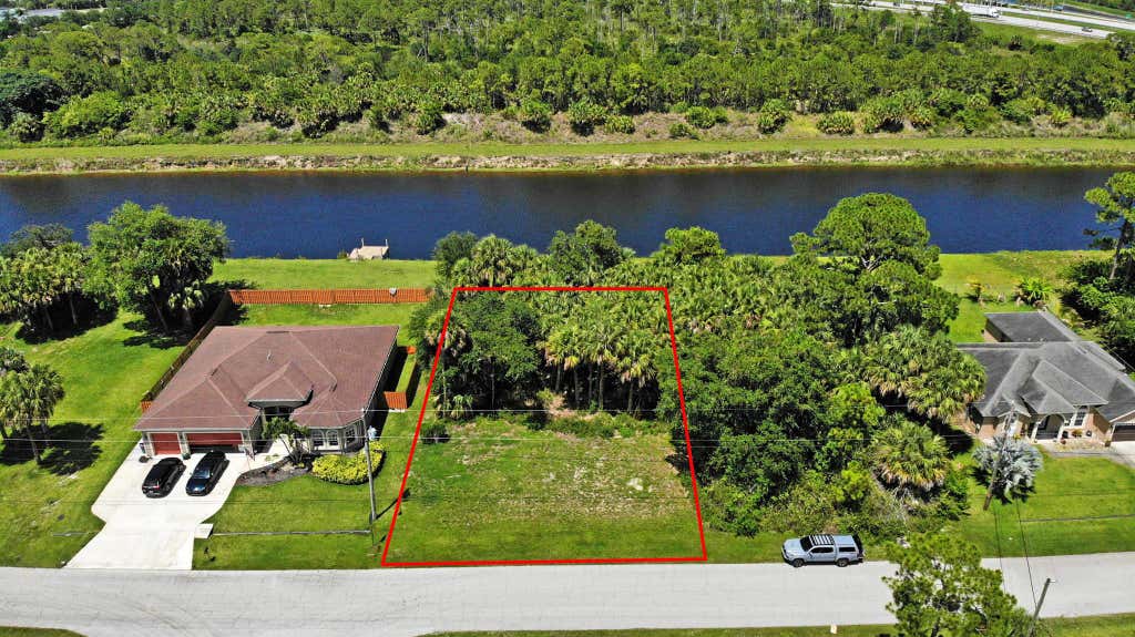 Photo of 2465 SW Galiano Road, Port Saint Lucie, FL 34953 (MLS # R10959969)