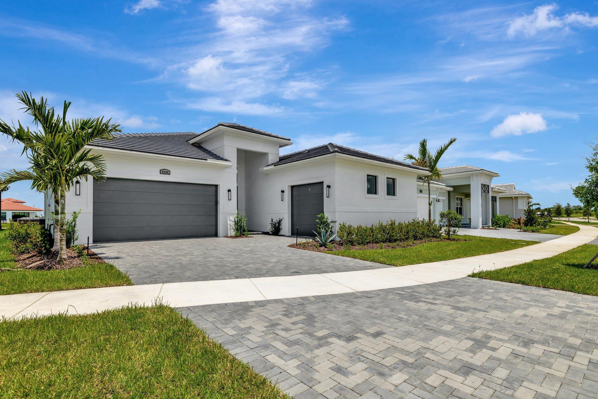 Are you waiting on your house to be build, Look no further. You just found your little piece of paradise to spend time in sunny Florida!This Spectacular residence Newly Constructed in 2025.No prior occupancy, Sidney model This home is full of light with a graceful, wide-open plan with a huge kitchen island. Prepare gourmet meals with a view of the stunning lake. All Appliances GE Last Generation. Close to shopping and I-95. All windows, sliders and doors are hurricane impact glass. Internet, cable, lawn care and all luxurious resort style amenities are included: state-of-the-art fitness center, aerobics studio, sauna indoor heated Olympic pool & non-stop social events. Incredible 27pickle-ball courts and 5 courts of Tennis & Basketball!. This is your opportunity. You Won't Want to Leave!