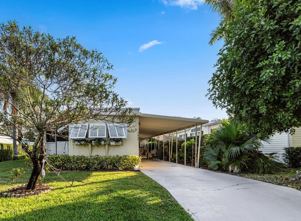 Photo of 7437 SE Swan Avenue, Hobe Sound, FL 33455 (MLS # R11038431)