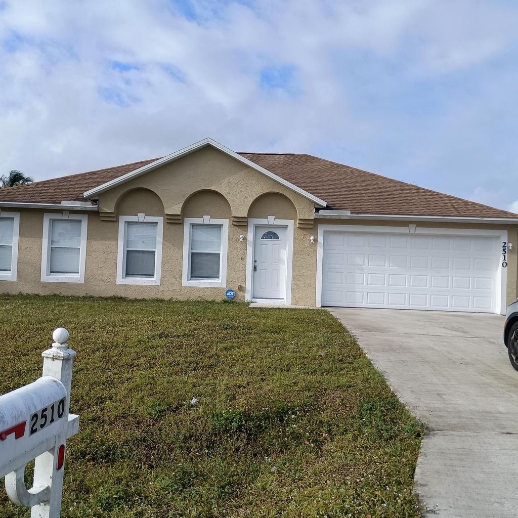 Photo of 2510 SW Chestnut Lane, Port Saint Lucie, FL 34953 (MLS # R11150244)