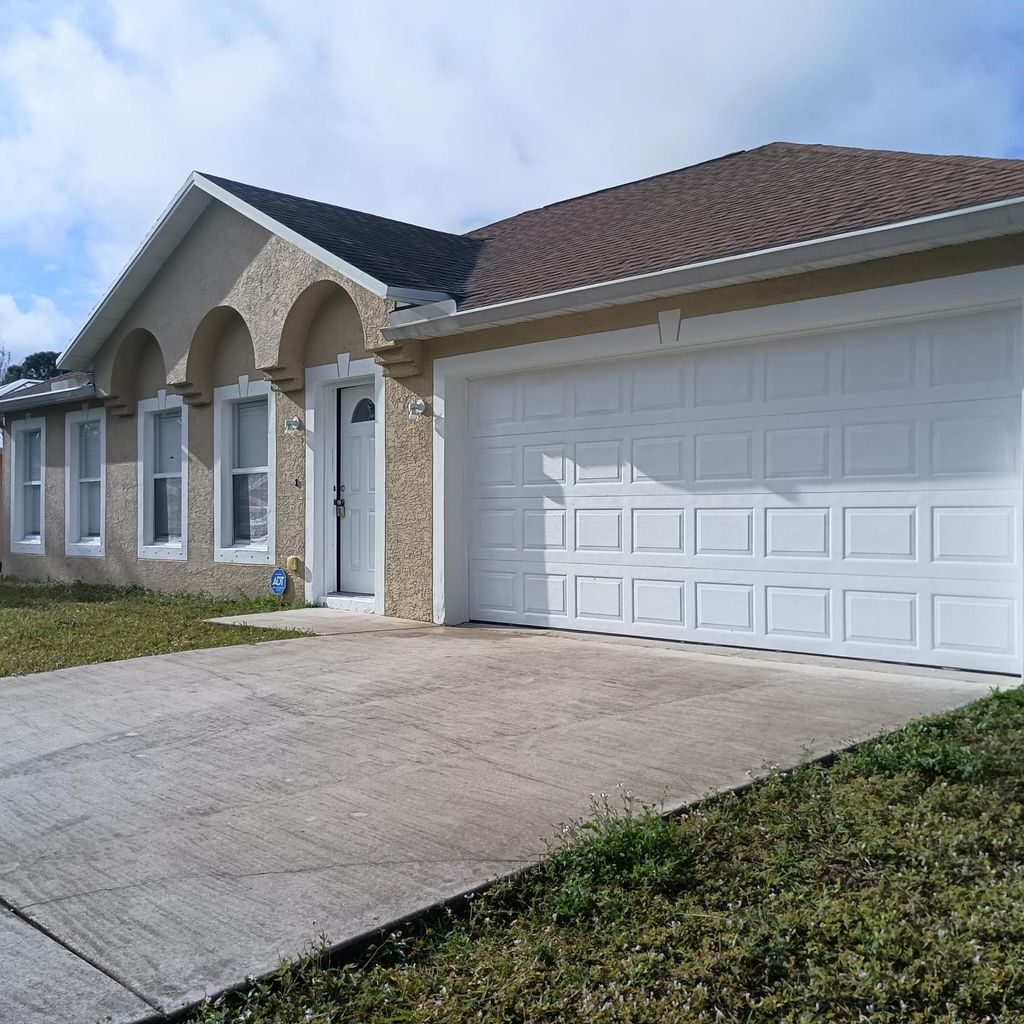 Photo of 2510 SW Chestnut Lane, Port Saint Lucie, FL 34953 (MLS # R11150244)