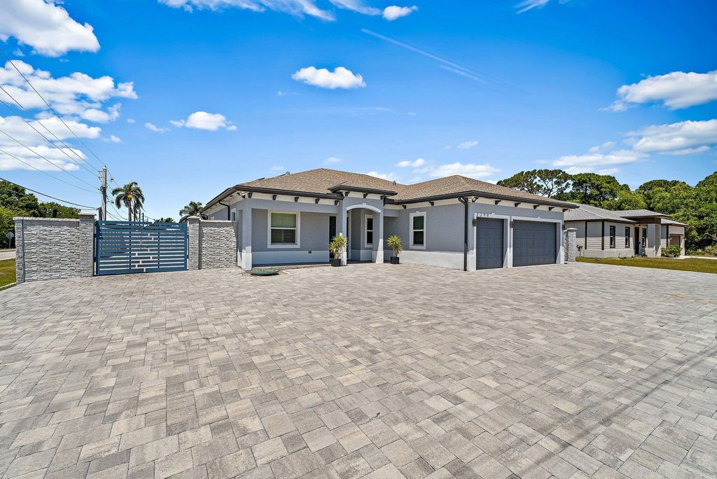 Photo of 2298 SE Pear Lane, Port Saint Lucie, FL 34952 (MLS # R11086262)