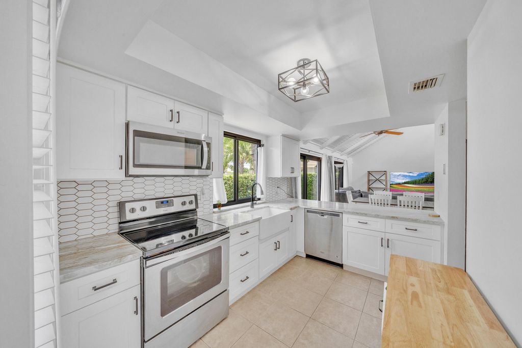 Photo of 235 NW 15TH Street, Boca Raton, FL 33432 (MLS # B26054990)