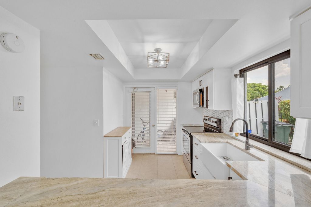 Photo of 235 NW 15TH Street, Boca Raton, FL 33432 (MLS # B26054990)