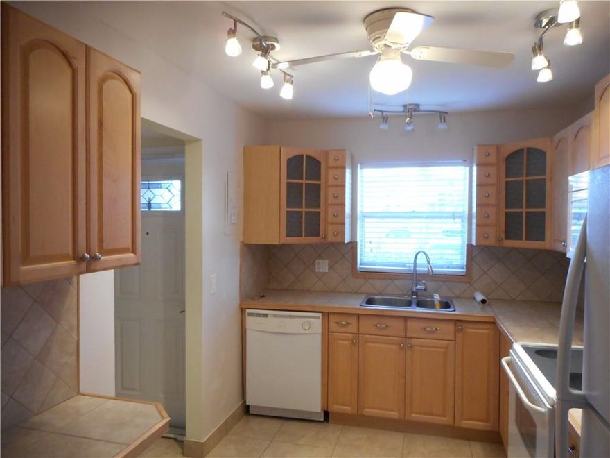 Centrally located condo, quiet 55+ community. Move in ready. Responsibly managed. New roof just completed. Desirable first floor entry with parking space right out front door. Close to mail box and laundry room, additional storage on back porch utility closet and in extra storage rooms. 5 minutes to 5 grocery stores,10 minutes to beautiful Deerfield Beach.