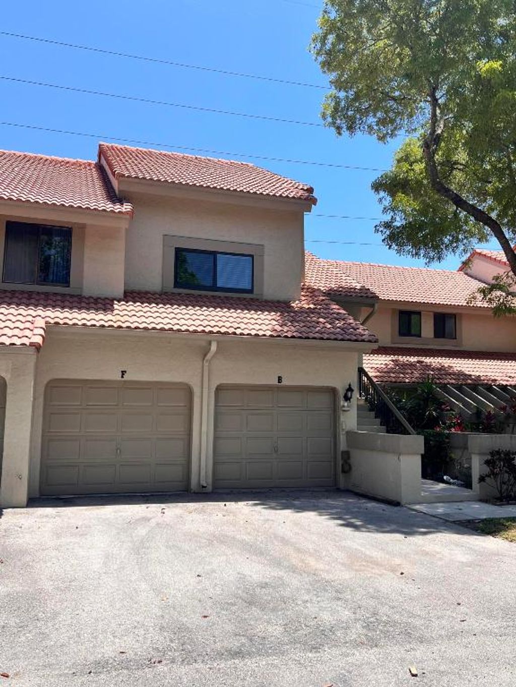 Photo of 5650 Coach House Circle #F, Boca Raton, FL 33486 (MLS # R10985603)