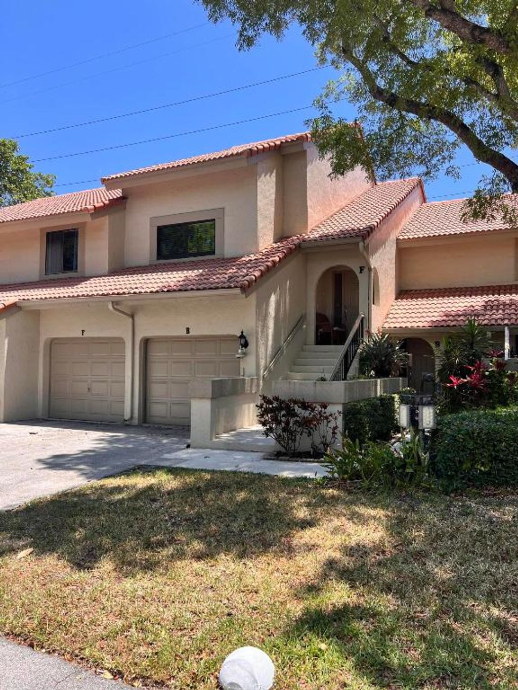 Photo of 5650 Coach House Circle #F, Boca Raton, FL 33486 (MLS # R10985603)