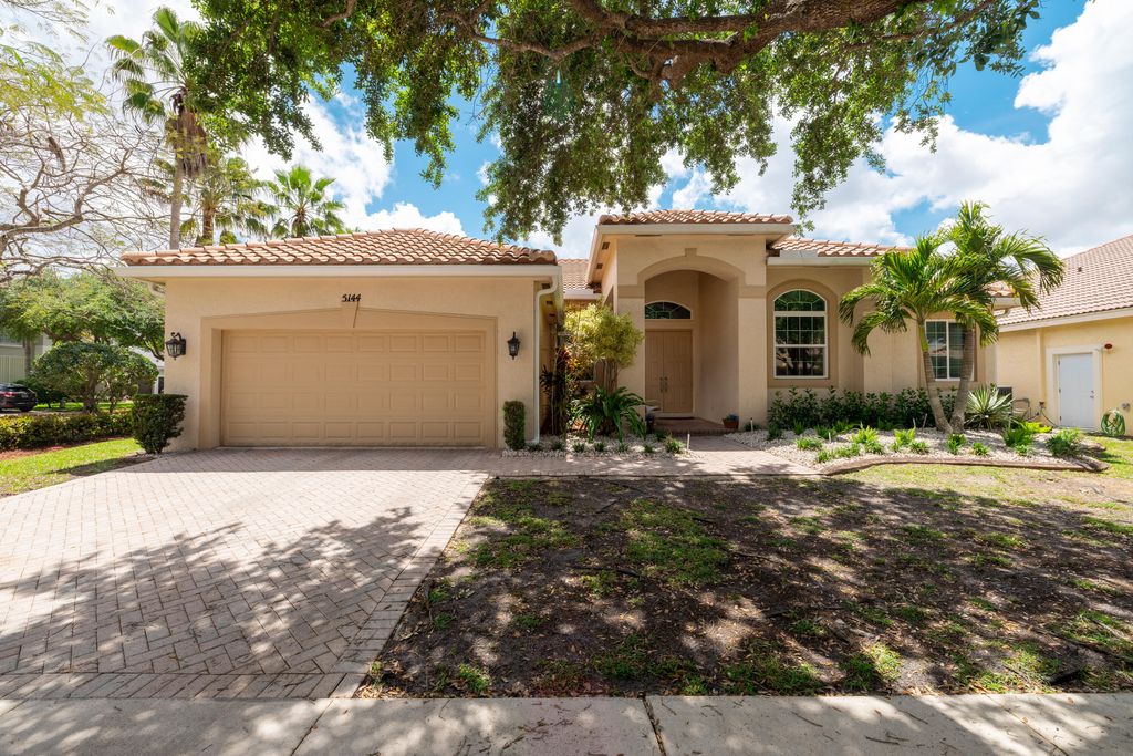 Photo of 5144 NW 74th Place, Coconut Creek, FL 33073 (MLS # B26012666)