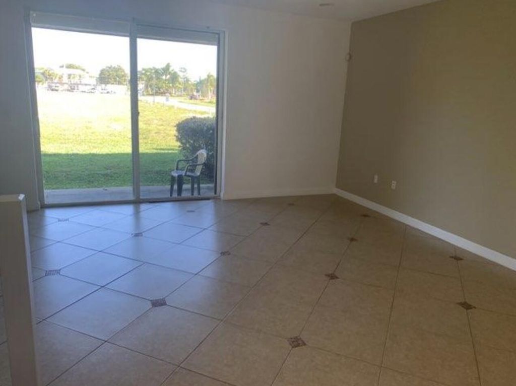 Photo of 4103 Napoli Lake Drive, Riviera Beach, FL 33410 (MLS # R10985714)