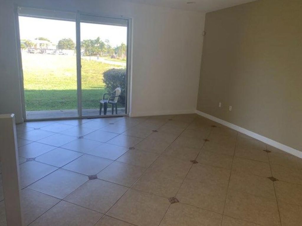 Photo of 4103 Napoli Lake Drive, Riviera Beach, FL 33410 (MLS # R10985714)