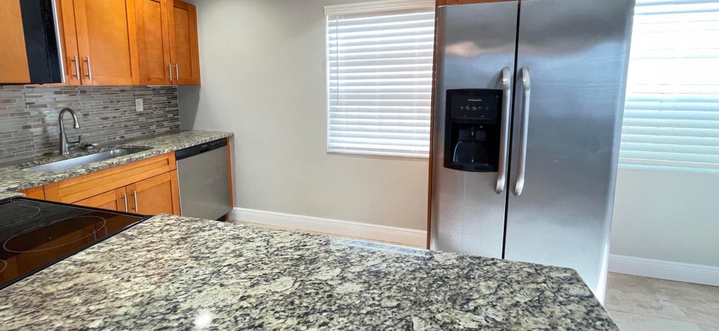 Photo of 174 Burgundy D Avenue #174, Delray Beach, FL 33484 (MLS # B26044772)