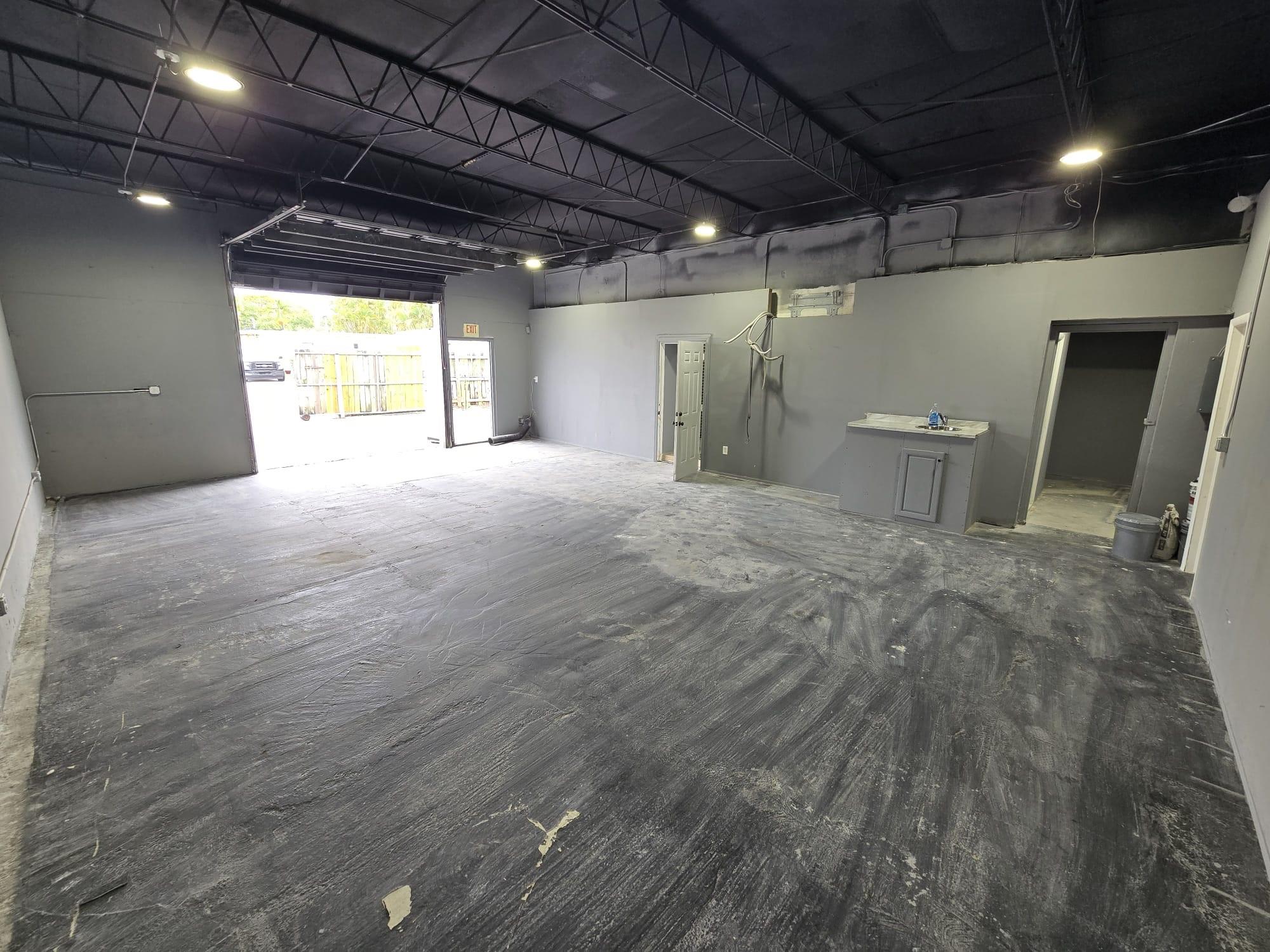 FOR LEASE IN HOLLYWOOD: This 1200 +/- SQFT open warehouse/flex space is perfect for a variety of businesses! Zoning is Federal Highway Medium-High Intensity Mixed-Use District which allows for retail-type opportunities, dry cleaners, pre-manufactured parts for sale, and much more. This is a very open and easily customizable space with two 10' grade-level doors. Unit has 3 assigned parking spots. Located very close to Downtown Hollywood and easy to access for both employees and clients alike. Come make it your own and grow your business! Contact to schedule a showing.