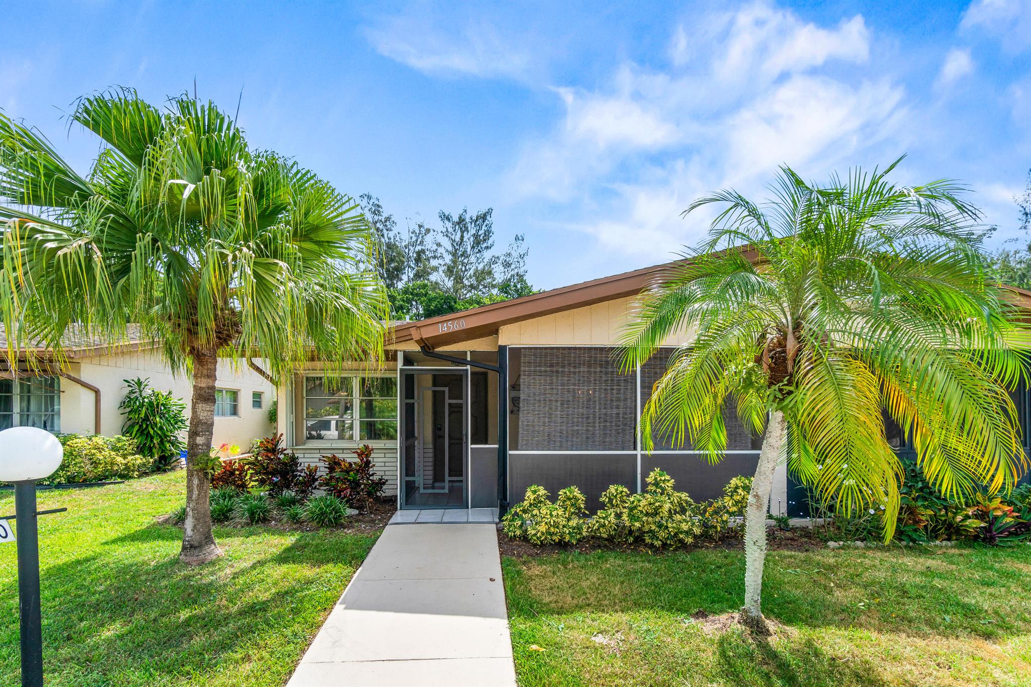 Welcome to this lovely villa in the 55+ community of Delray Villas where natural light floods every room, creating a warm and inviting vibe. The kitchen has been tastefully updated with newer cabinets, stainless steel appliances, and sleek granite countertops, all enhanced by natural finishes. Both bathrooms have been refreshed with neutral design and tasteful finishes.Picture yourself enjoying your morning coffee on the oversized enclosed front porch or winding down in the evening with a good book. Full-sized washer and dryer. This villa offers a perfect blend of tranquility and active adult lifestyle. Don't let this opportunity slip by! Also available for rent.
