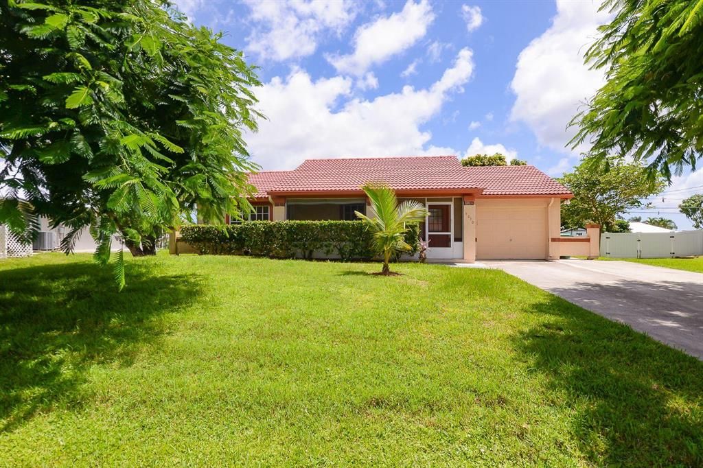 Photo of 5030 NW Erskin Terrace, Port Saint Lucie, FL 34983 (MLS # R10739763)