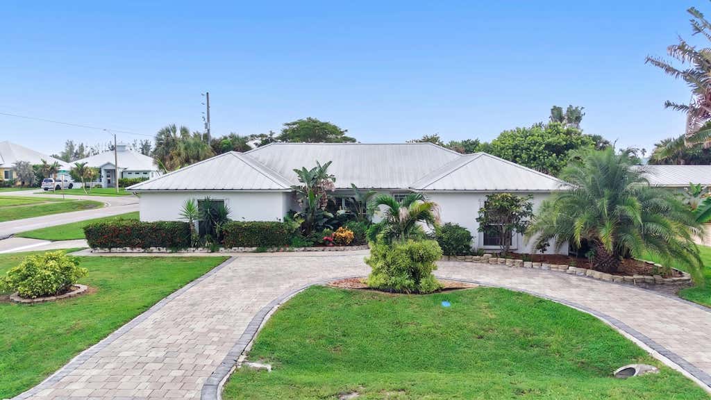 Photo of 1577 THUMB POINT Drive, Fort Pierce, FL 34949 (MLS # B26069242)