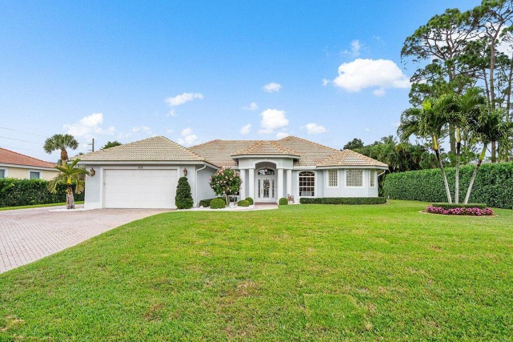Photo of 100 N Country Club Boulevard, Atlantis, FL 33462 (MLS # R10963306)