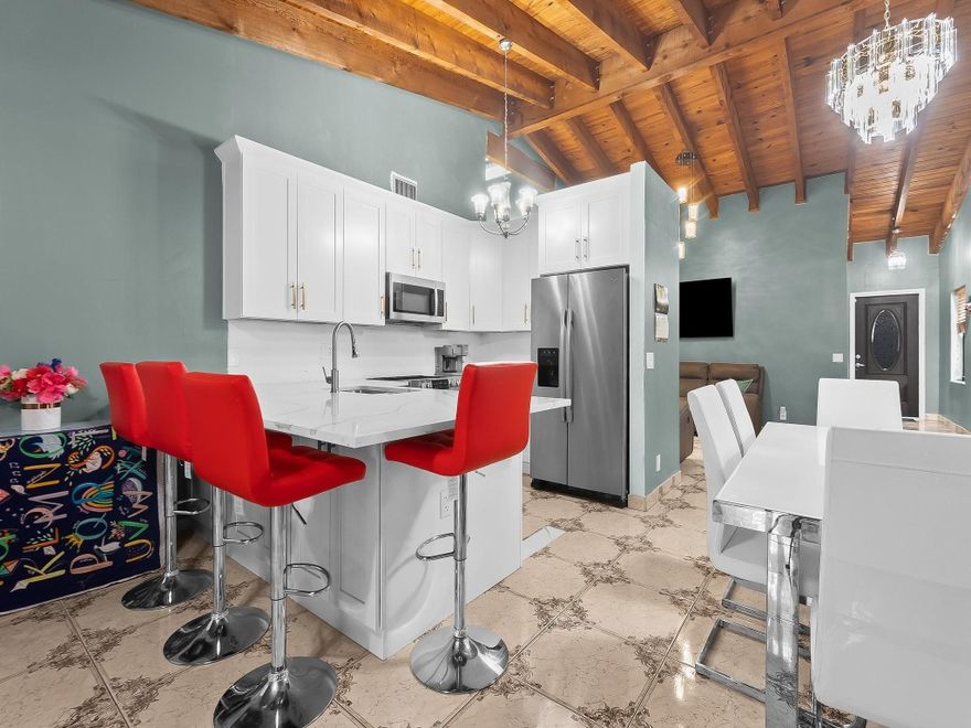 New Kitchen, new bathrooms, new roof - just move in! Discover this beautifully renovated corner-lot townhouse with 3 bedrooms and 2 bathrooms, nestled in the Brentwood Manors community with low HOA fees! This charming home offers over 1,500 square feet of modern living. An open-concept design features a welcoming living room, a stylish kitchen with quartz countertops, new stainless steel appliances, and a spacious dining area perfect for entertaining. The primary bedroom includes a walk-in closet and a lovely new bathroom, with an additional updated hall bath. Natural light fills the living area of the home through the new skylight, and recent upgrades, such as a new roof, add an extra sense of peace of mind. Fenced backyard—an ideal spot for relaxing or hosting outdoor gatherings.