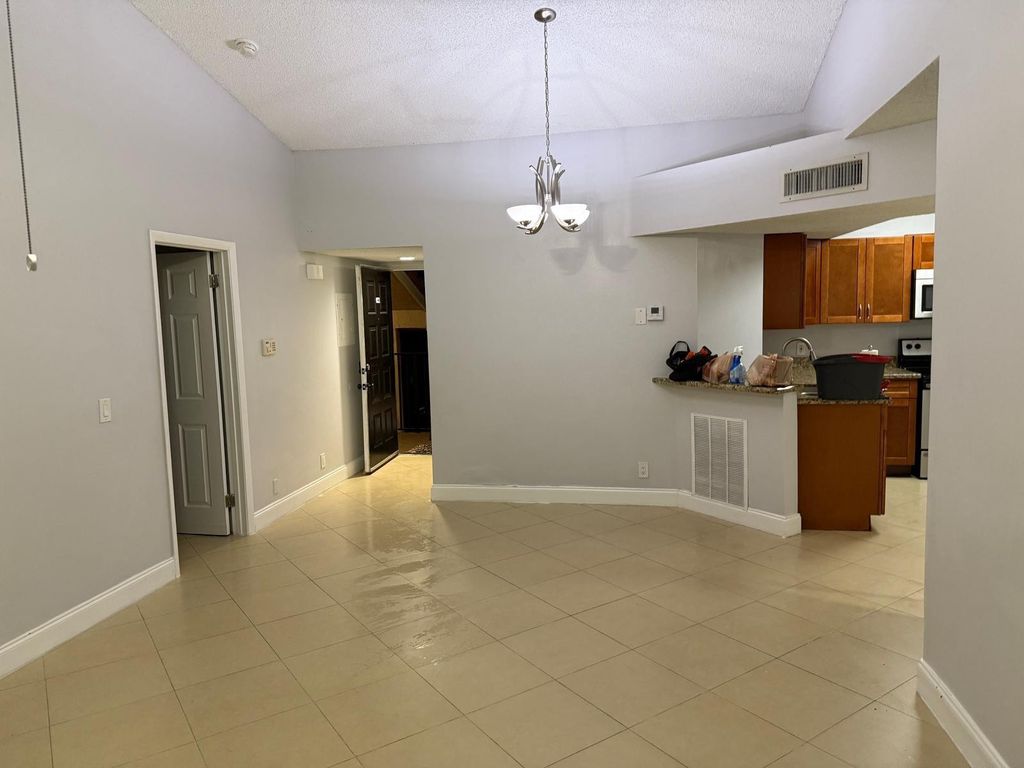 Photo of 8741 Wiles Road #302, Coral Springs, FL 33067 (MLS # F10490235)