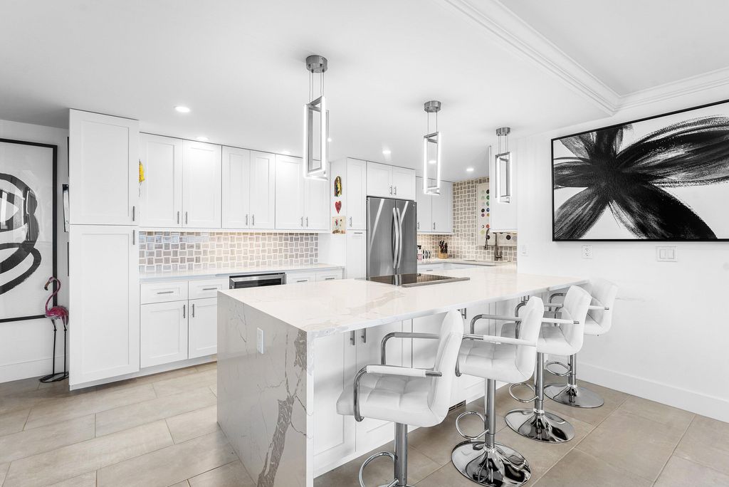Photo of 336 Golfview Road #Ph12, North Palm Beach, FL 33408 (MLS # B26014048)