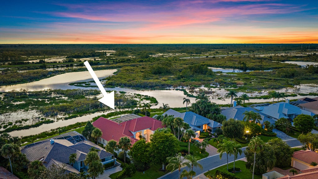 Photo of 64 Cayman Place, Palm Beach Gardens, FL 33418 (MLS # B26077019)