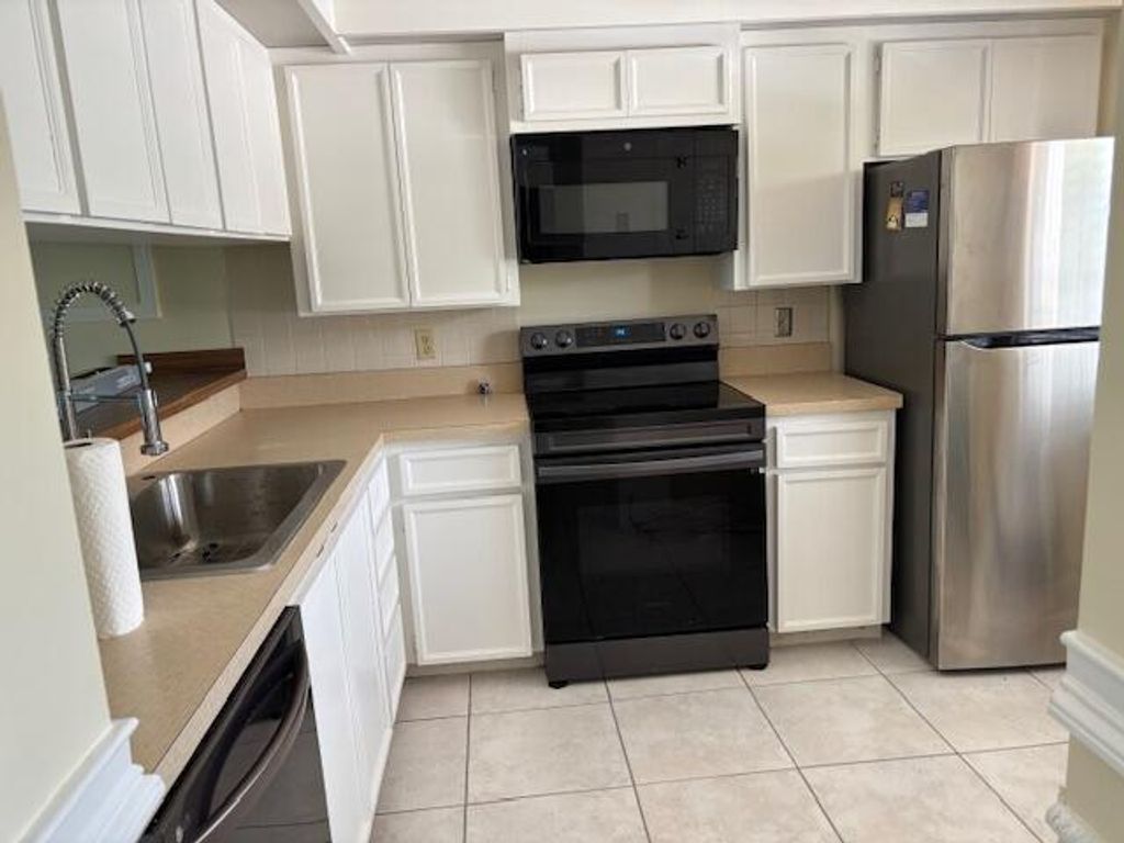 Photo of 3525 Village Boulevard #203, West Palm Beach, FL 33409 (MLS # R11111646)