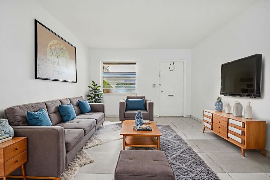 Beautifully maintained 1-bedroom co-op in the heart of Hollywood—just minutes to the beach and downtown. Bright, open layout with large windows, tile floors, and tropical views. Peaceful boutique community with friendly residents, a private garden and BBQ area, low fees, and no age restrictions. Rentals allowed, making it perfect for seasonal, year-round, or investment use. Maintenance includes water, sewer, trash, landscaping, and exterior insurance. Walk to shops, restaurants, and Young Circle; short drive to the beach and airport.