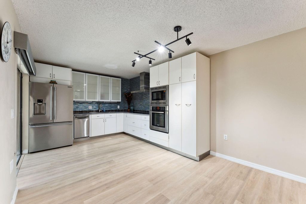 Photo of 2508 25th Lane, Palm Beach Gardens, FL 33418 (MLS # B26001442)