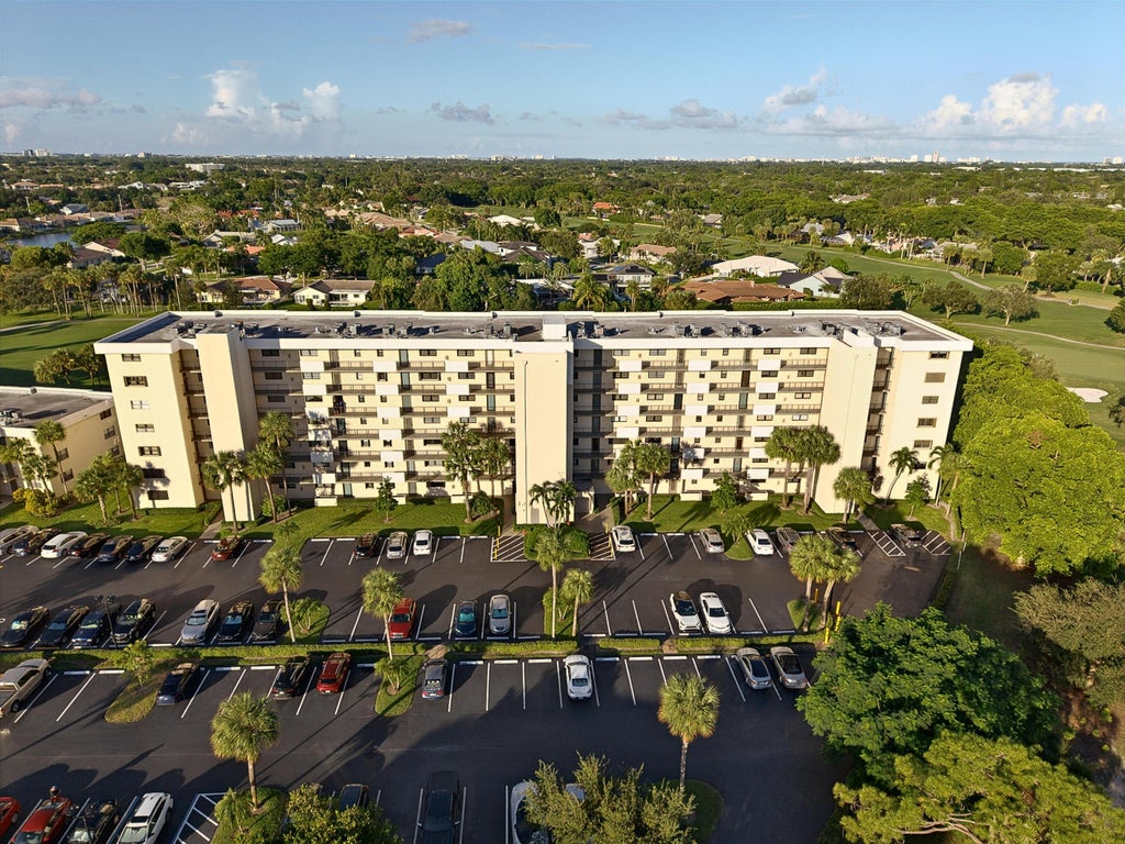 Photo of 2430 DEER CREEK COUNTRY CLUB Boulevard #704-2, Deerfield Beach, FL 33442 (MLS # B26092243)