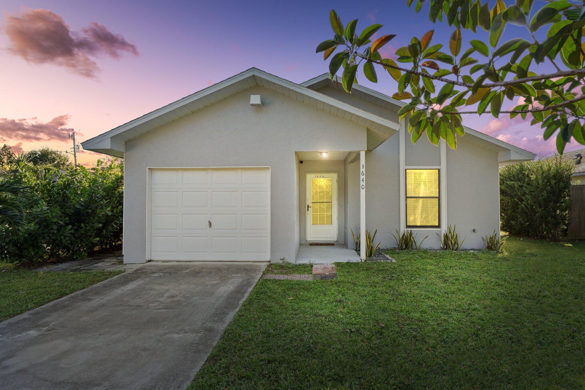 Discover this Immaculate 2 Bedroom, 2 Bathroom, 1 Car Garage Home, in the heart of Vero Beach, situated in a very desirable and quiet neighborhood! This Home has it ALL! This Stunning Home has Natural Light beaming from every angle! NEW Fence- 2023, NEW A/C- 2019, NEW W/H- 2022, Front Door Keypad and so much more. Completely Remodeled including the Flooring, Kitchen and Bathrooms! Step inside this inviting, open Floor Plan with Vaulted ceilings in the main Living Areas! The Kitchen boasting NEW Cabinets, S/S Appliances, Granite Countertops, Breakfast Bar and a Dining Area! Featuring 2 Glass Sliding Doors leading out to your Screened in Patio and Fenced in yard, this is a great Home for entertaining with friends and family.