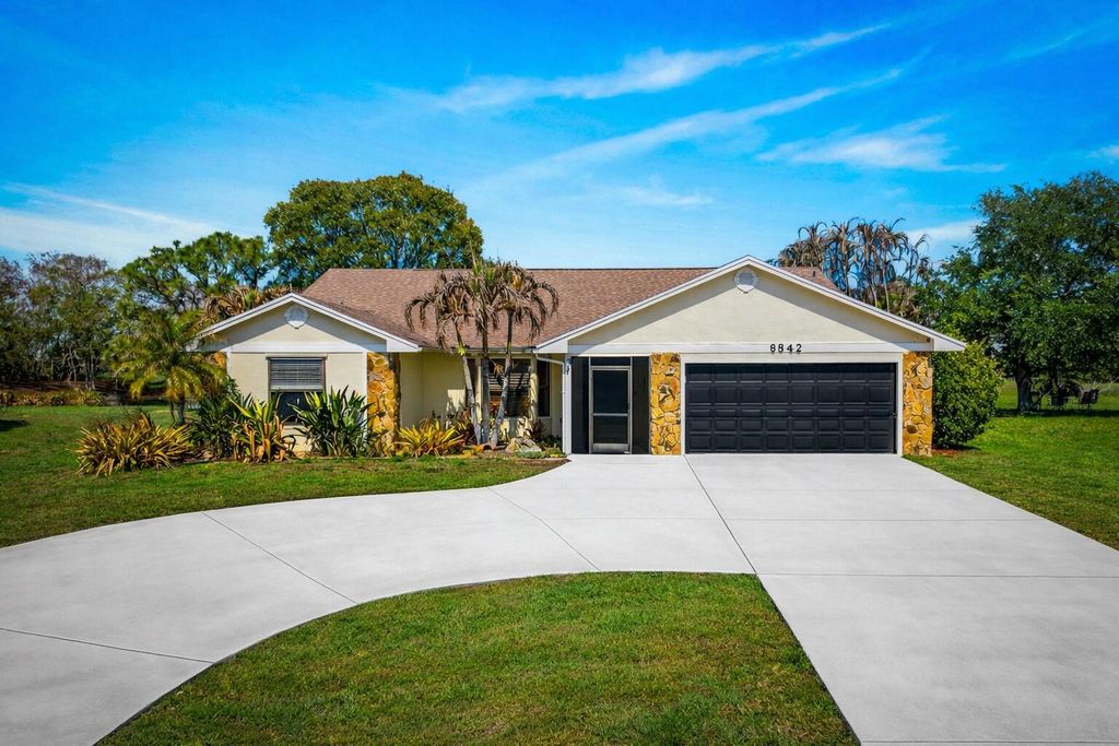 Photo of 6842 NW Granger Avenue, Port Saint Lucie, FL 34983 (MLS # B26007645)
