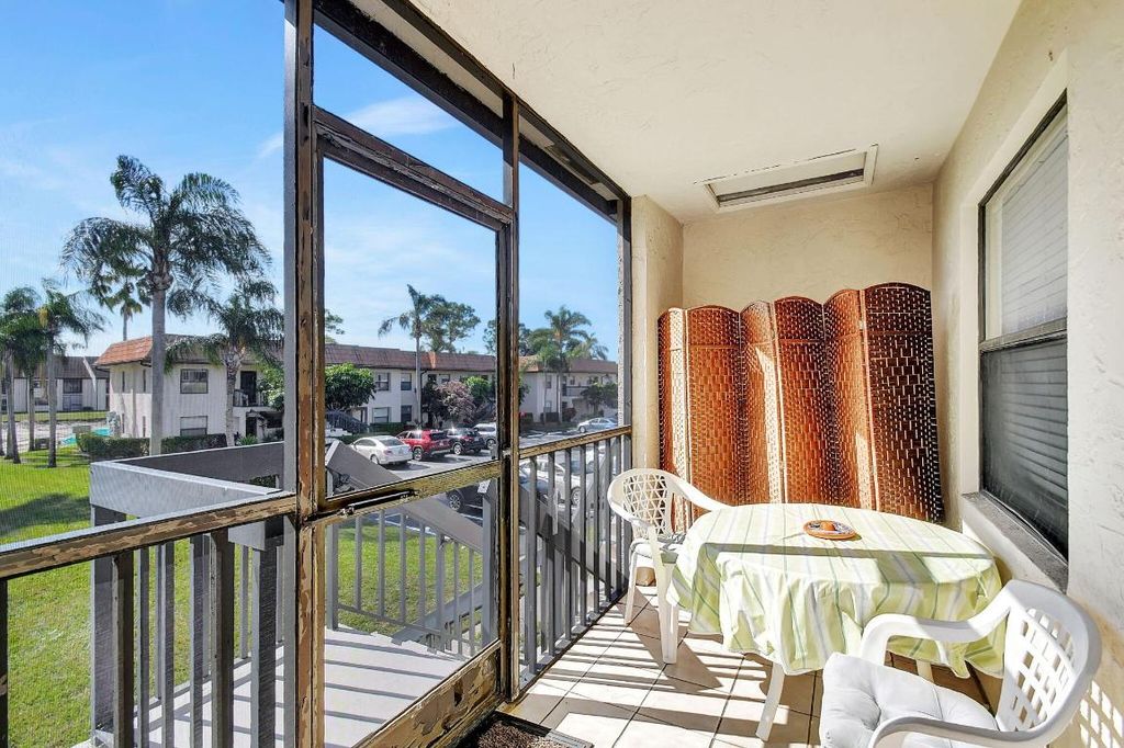 Photo of 7166 Golf Colony Court #203, Lake Worth, FL 33467 (MLS # R11134340)