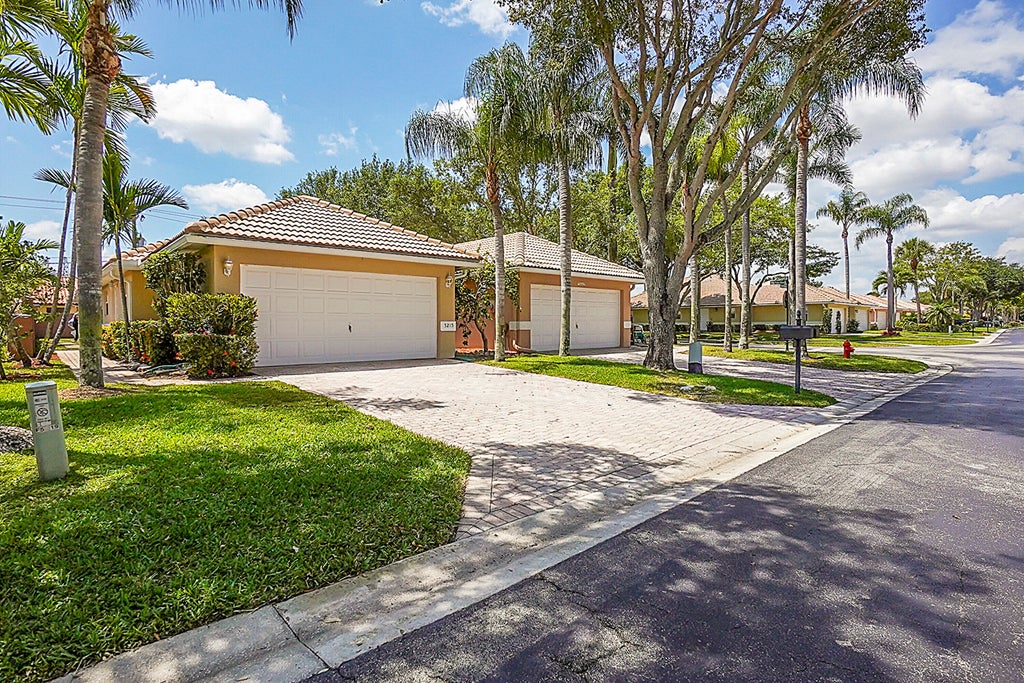 Photo of 5215 Grande Palm Circle, Delray Beach, FL 33484 (MLS # B26081218)