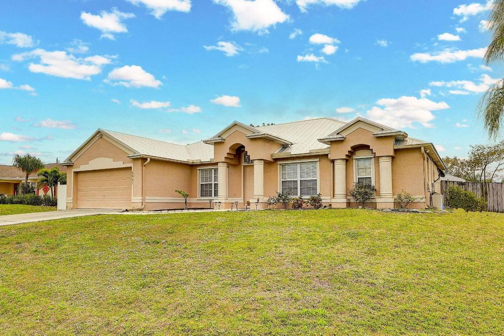 Photo of 6927 NW Brookhaven Avenue N, Port Saint Lucie, FL 34983 (MLS # R10966269)