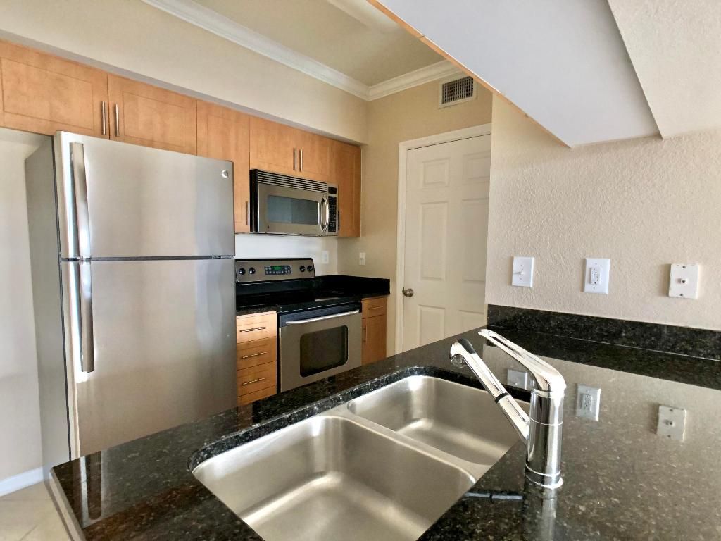 Photo of 6466 Emerald Dunes Drive #203, West Palm Beach, FL 33411 (MLS # R11143720)