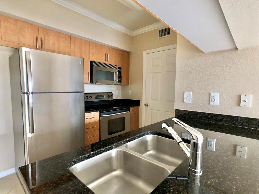 Photo of 6466 Emerald Dunes Drive #203, West Palm Beach, FL 33411 (MLS # R11143720)