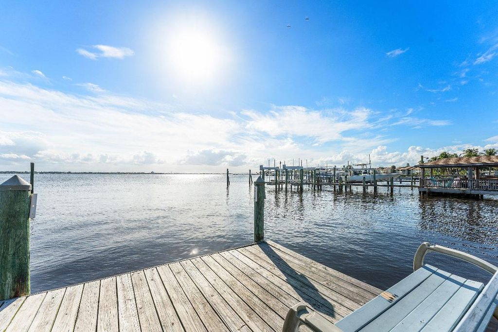 Photo of 1395 NE Waveland Avenue E, Jensen Beach, FL 34957 (MLS # R11139343)