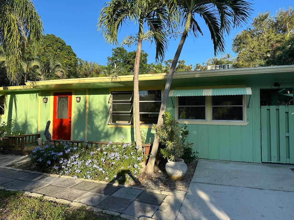 Photo of 1395 NE Waveland Avenue E, Jensen Beach, FL 34957 (MLS # R11139343)