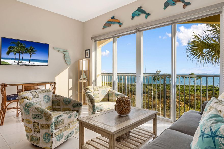 Discover exceptional value at Harbour Isle West on Hutchinson Island! Wide-water Intracoastal views shine from the Florida room, while a bonus room provides ideal storage for island passions like fishing, boating, photography, kiteboarding, and nature adventures. RARE resort-style, pet-friendly community: 2 pets, any sz allowed! This nearly 2,000 sqft residence offers 10' ceilings and solid concrete-block construction for true peace of mind, impact windows/doors, plus a completed reserve study and structural integrity report. Upgrades include newer A/C, water heater, reinforced/refaced cabinets, wine cooler, and plantation shutters! Assoc allows 90-day min rentals 2x/yr. Amenities include a dog park, gated access, marina, pool, tennis, fitness, and clubhouse. Lives like a private home!