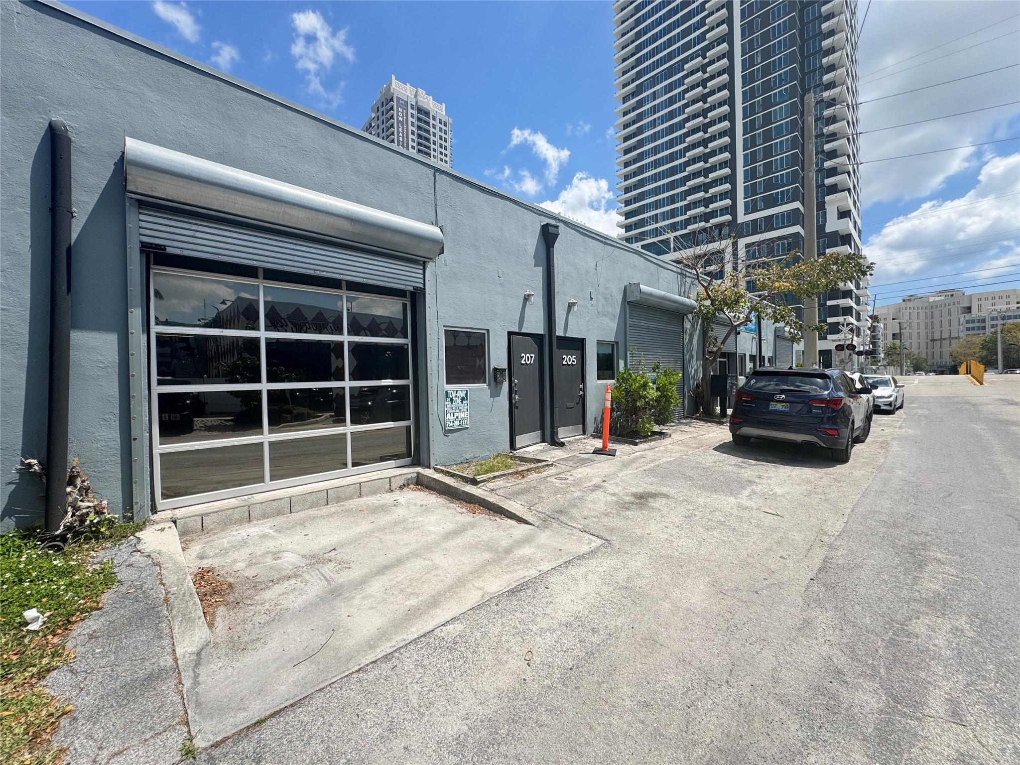 1100 sf warehouse with very liberal zoning. OK for ceramic coating for cars, retail, office. Discover the perfect business location in the heart of Downtown Fort Lauderdale, just steps away from the vibrant Las Olas Blvd. Ideal for retail, creative office, or flex industrial use, this space offers flexibility and convenience in a prime location. Modern glass garage doors seamlessly connect the indoor and outdoor spaces, adding a touch of sophistication. On-site free parking eliminates the hassle of searching for space, ensuring convenience for both tenants and clientele. The property is centrally located in TREDD (Tarpon River Entertainment District) and is walking distance to bars, restaurants, and coffee shops. Suites:
