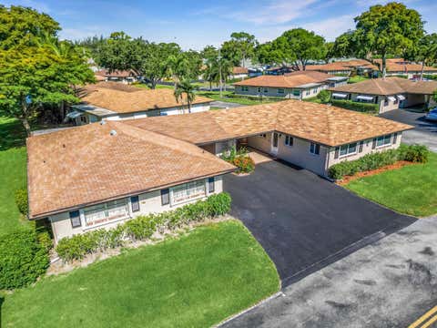 Photo of 501 Sandpiper Circle, Delray Beach, FL 33445 (MLS # B26026221)