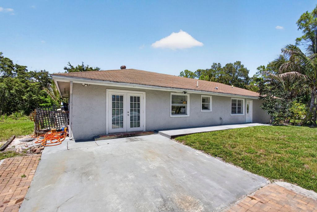 Photo of 16663 89th Place N, The Acreage, FL 33470 (MLS # B26026354)