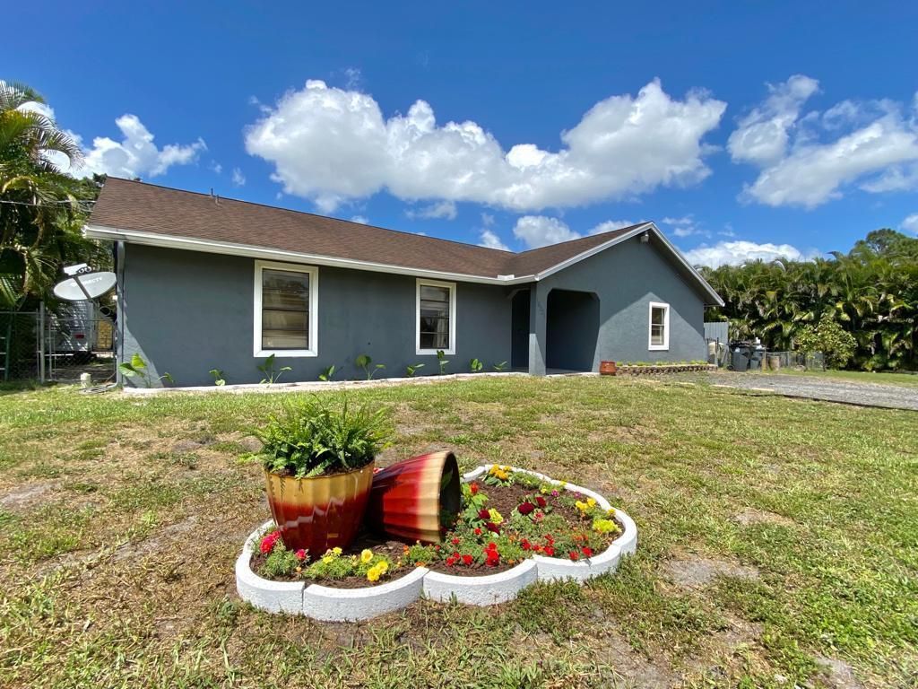 Photo of 16321 E Mayfair Drive, Loxahatchee, FL 33470 (MLS # R10768875)