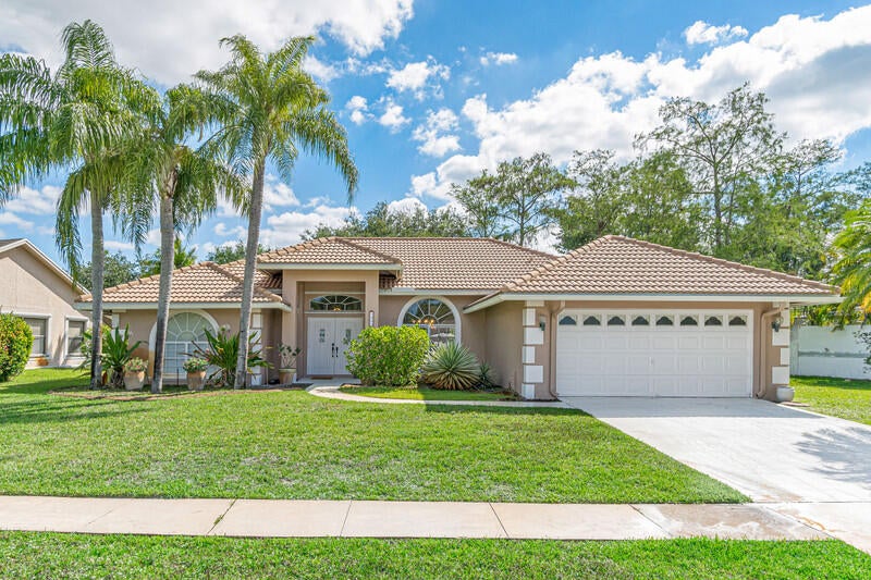 Photo of 1840 Hollyhock Road, Wellington, FL 33414 (MLS # B26079591)