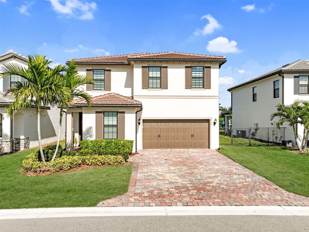 Photo of 8641 Patron Lane, Lake Worth, FL 33467 (MLS # F10552013)