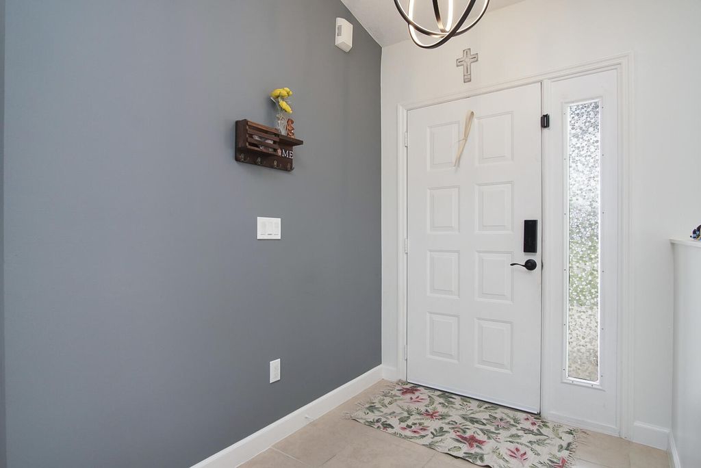 Photo of 1330 SW Empire Street, Port Saint Lucie, FL 34983 (MLS # B26017994)