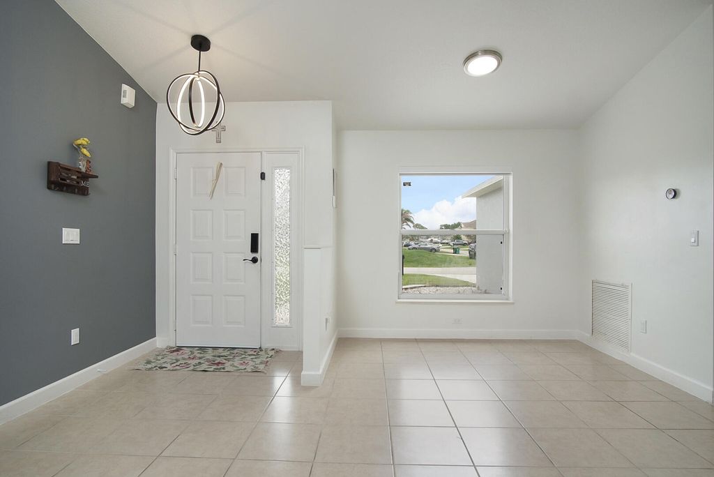 Photo of 1330 SW Empire Street, Port Saint Lucie, FL 34983 (MLS # B26017994)