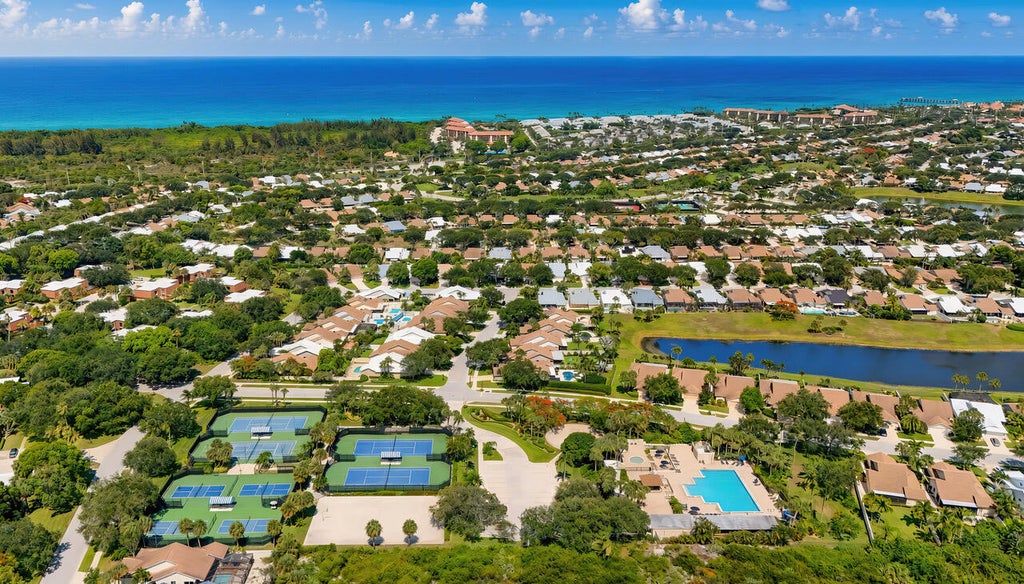 Photo of 325 LEEWARD Drive, Jupiter, FL 33477 (MLS # B26085780)