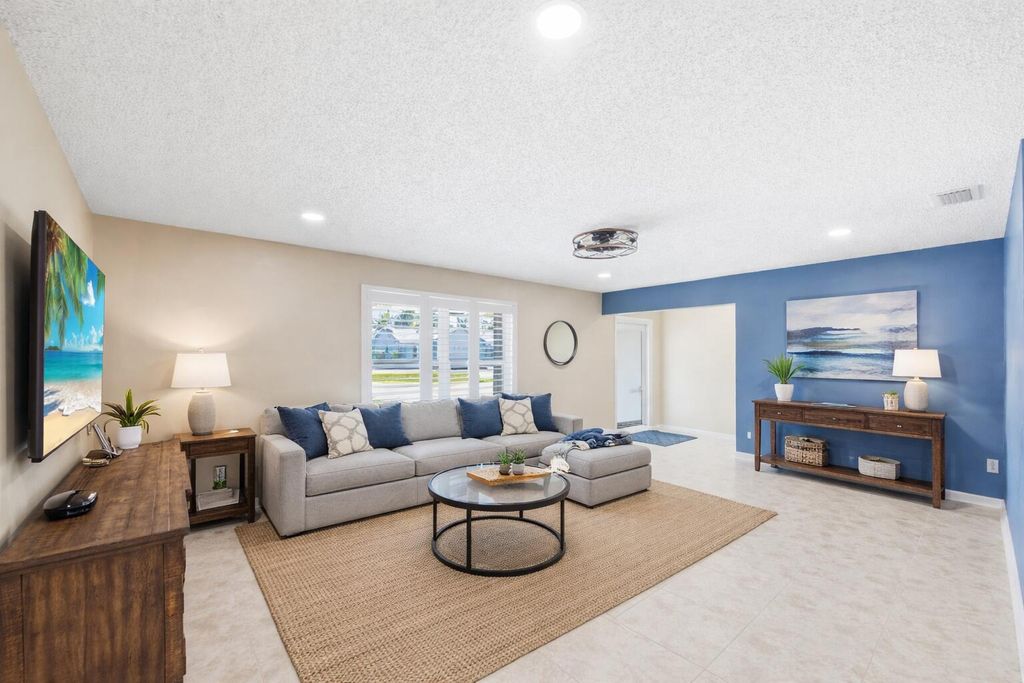 Photo of 1207 Sea Pines Lane, Lantana, FL 33462 (MLS # B26008019)