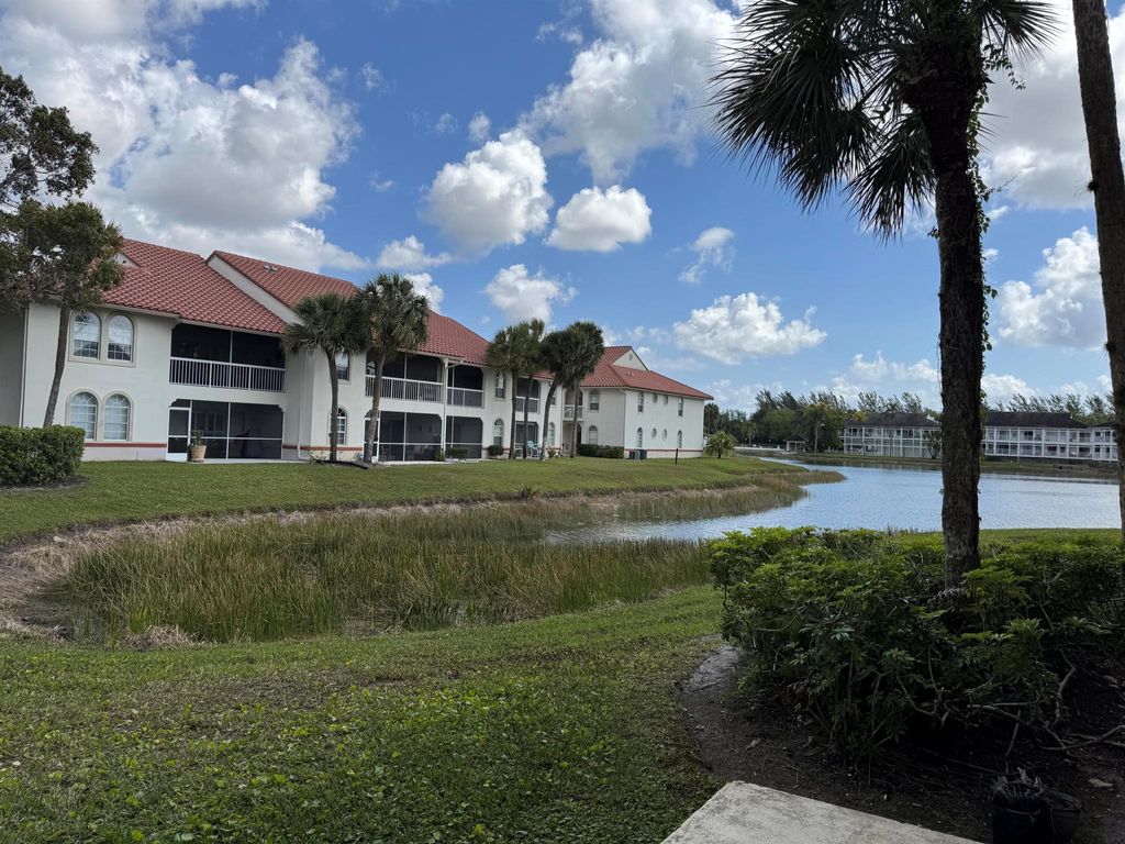 Photo of 130 Cypress Point Drive, Palm Beach Gardens, FL 33418 (MLS # R11083182)