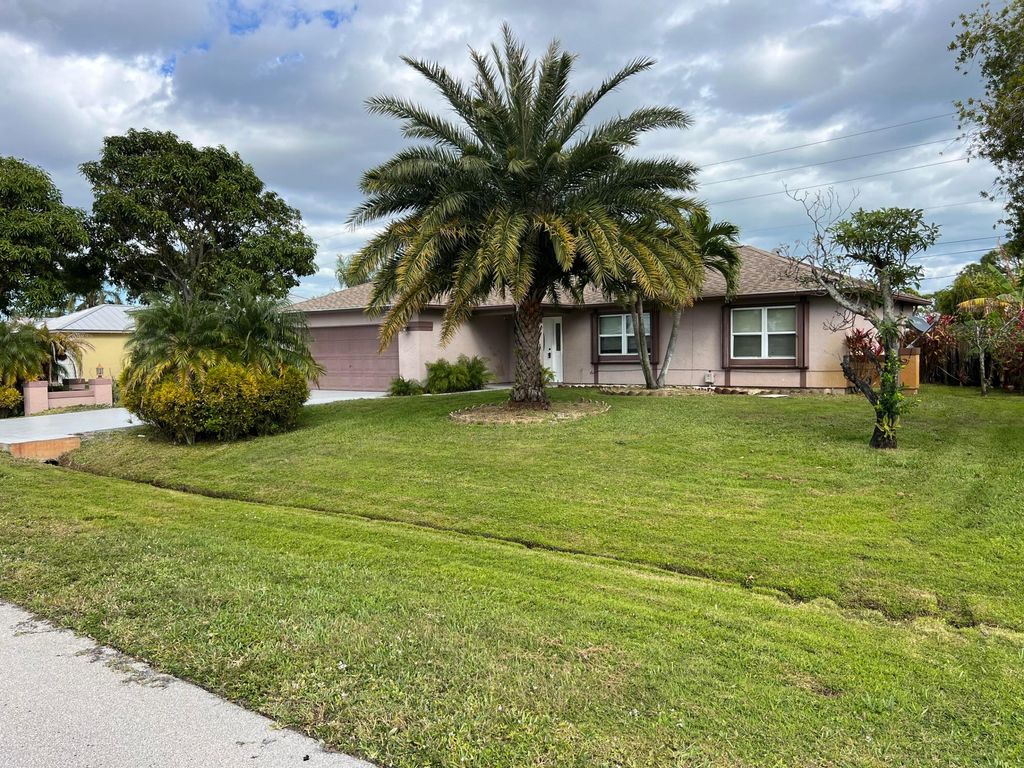 Photo of 1561 SE Appamattox Terrace, Port Saint Lucie, FL 34952 (MLS # R11163180)
